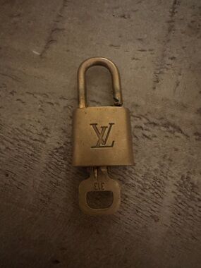 Louis Vuitton Brass Padlock in Aged Gold